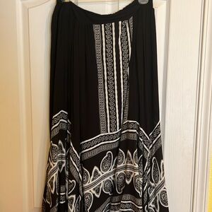 Cato asymetrical black/white skirt . Sheer overlay from knee sz M